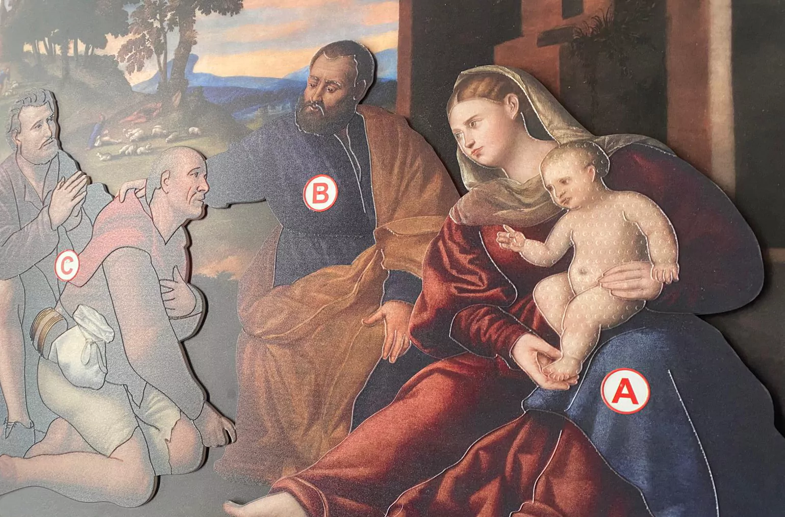 Il dettaglio del pannello tattile dell'Adorazione di Bernardino Licinio (1530) conservato nel Museo Diocesano di Brescia